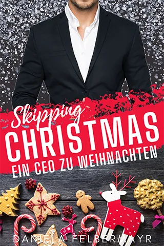 Mann mit schwarzem Anzug über weihnachtlichem Gebäck